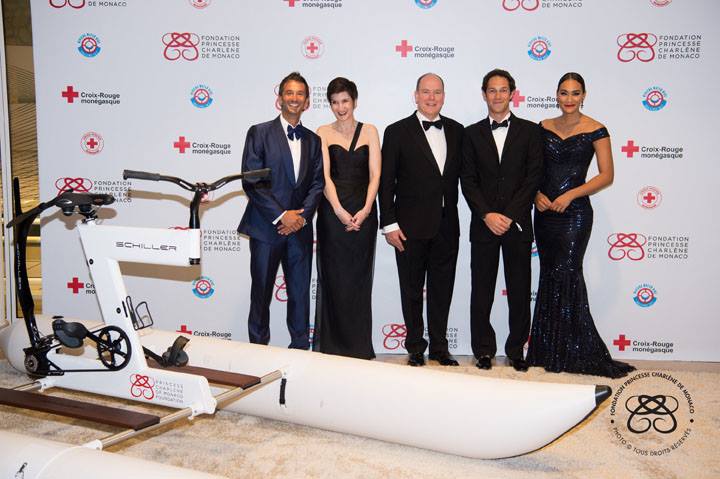 (L-R): Pierre Frolla, Ambassador for the Princess Charlene of Monaco Foundation, Agnès Falco, Secretary General of the Princess Charlene of Monaco Foundation, HSH Prince Albert II, Bruno Senna, Ambassador for the Princess Charlene of Monaco Foundation, and Jo-Ann Strauss, Master of Ceremonies Photo: © Eric Mathon / Palais Princier