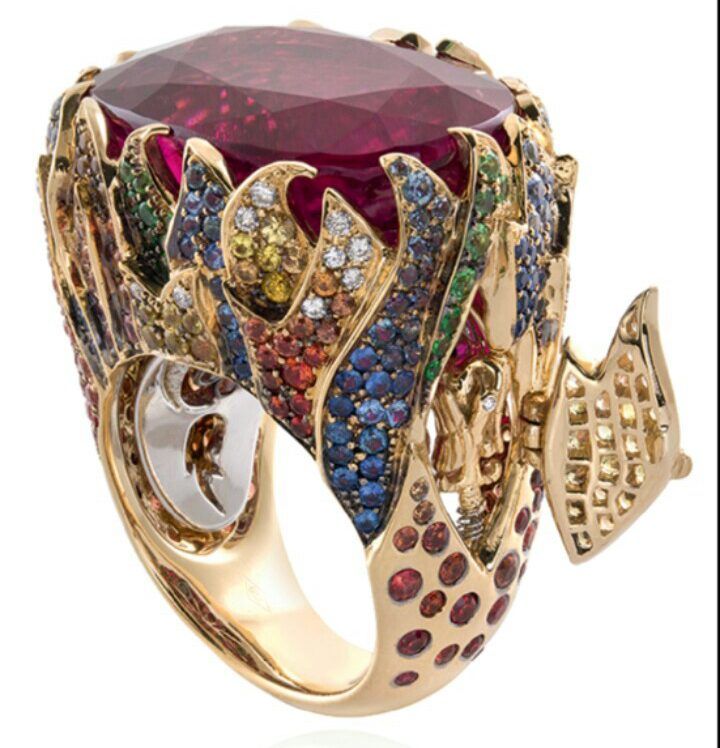 Alessio Boschi Flames Rubelite Ring in 18k gold set with rubellite (28.38ct), colourless diamonds (0.39ct), black diamonds (0.07ct), tsavorite (0.39ct), yellow sapphire (0.96ct), blue sapphire (0.98ct), and orange sapphire (1.74ct)